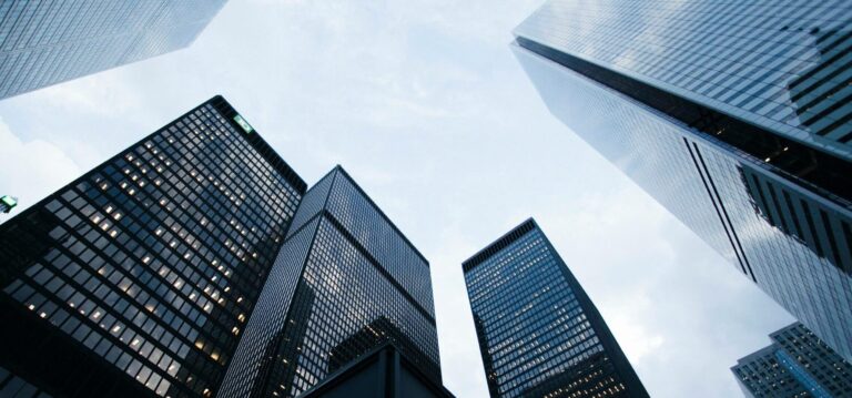 Commercial building skyline representing energy management in offices