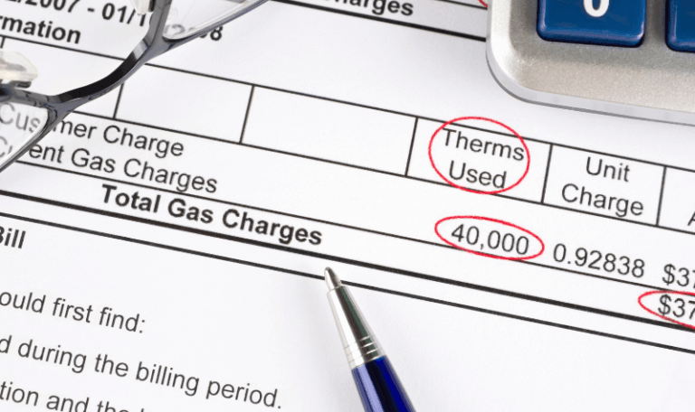 Utility auditing for accounting departments reviewing total gas charges and therms used on a detailed invoice